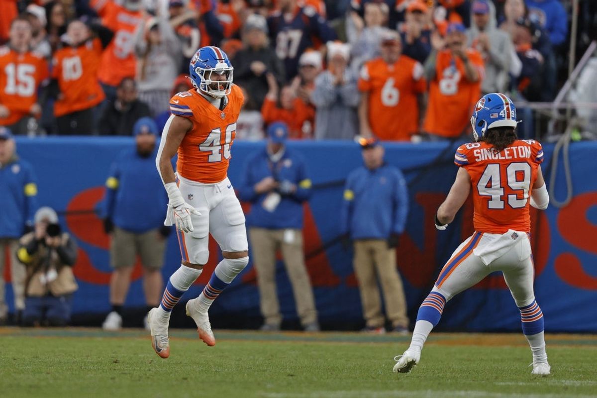 Jan 4, 2026; Denver, Colorado, USA; Denver Broncos linebacker Justin Strnad (40) celebrates after a sack during the second half against the Los Angeles Chargers at Empower Field at Mile High. Mandatory Credit: Isaiah J. Downing-Imagn Images