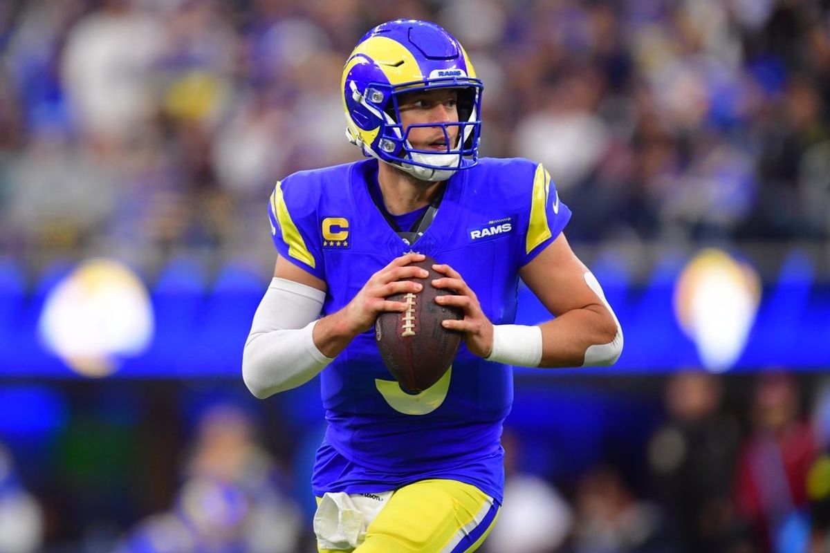 Jan 4, 2026; Inglewood, California, USA;  Los Angeles Rams quarterback Matthew Stafford (9) looks downfield against the Arizona Cardinals during the second half at SoFi Stadium. Mandatory Credit: Gary A. Vasquez-Imagn Images