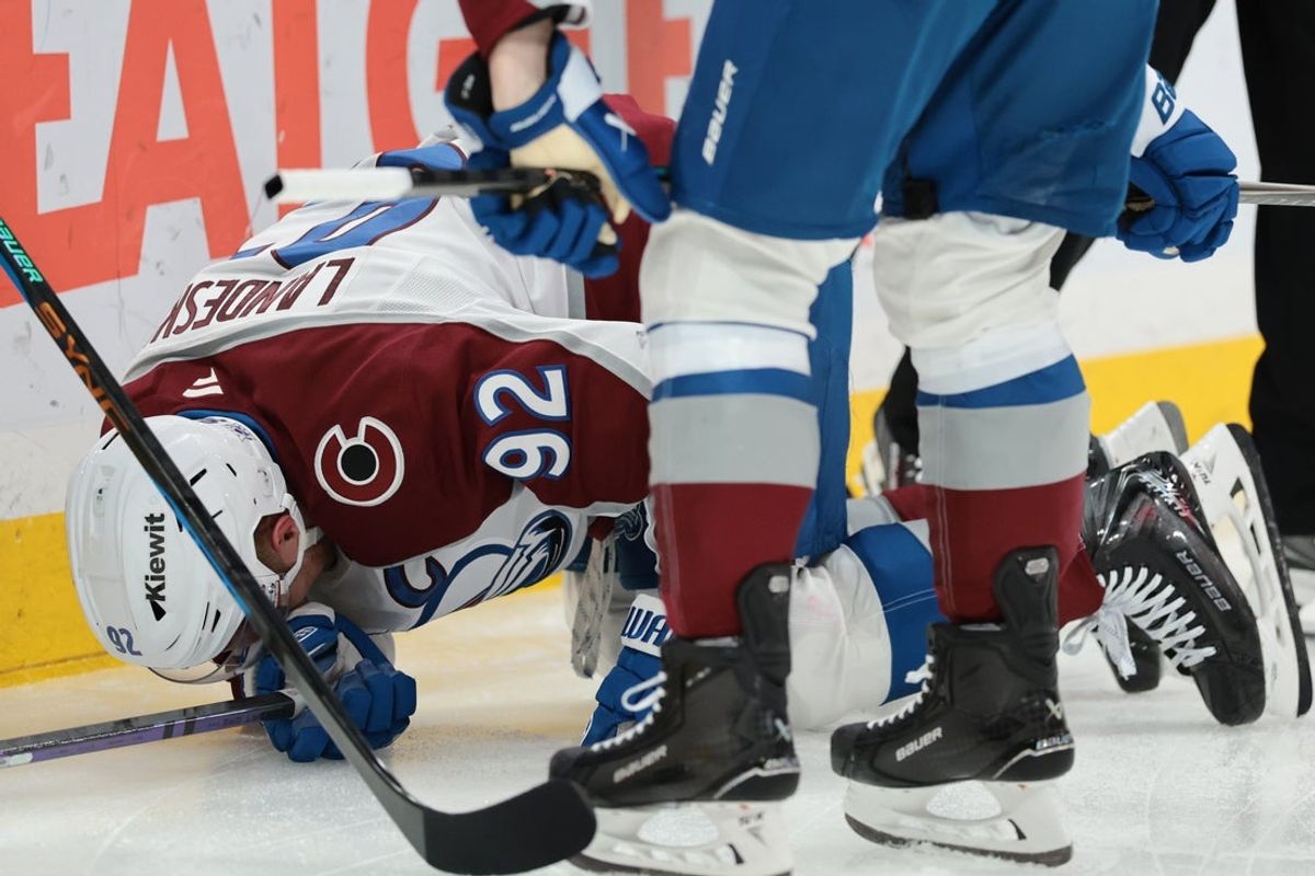 Jan 4, 2026; Sunrise, Florida, USA; Colorado Avalanche left wing Gabriel Landeskog (92) reacts after crashing against the goal post during the second period against the Florida Panthers at Amerant Bank Arena. Mandatory Credit: Sam Navarro-Imagn Images