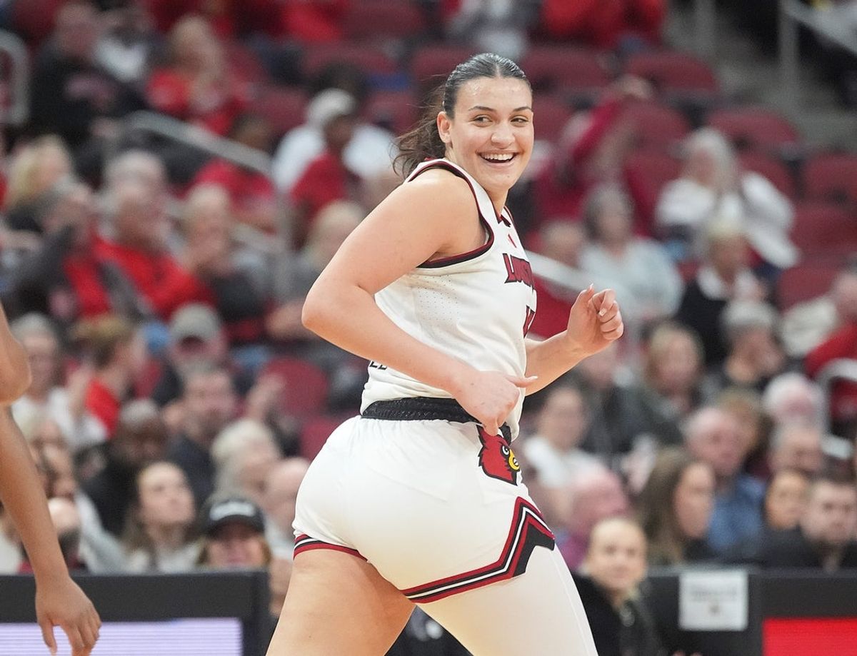 Louisville's forward Elif Istanbulluoglu (11) celebrates the shot against Virginia Tech’s Kilah Freelon Sunday afternoon in the KFC Yum! Center.
Jan. 4, 2026