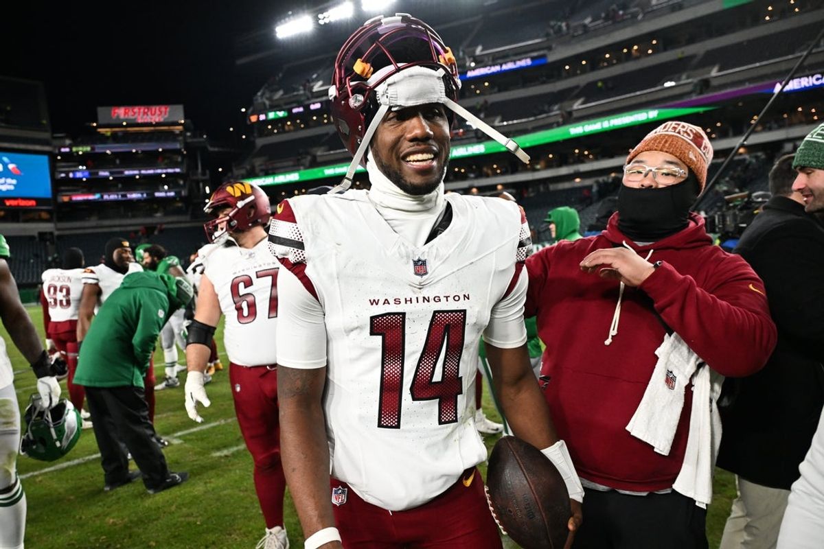 Jan 4, 2026; Philadelphia, Pennsylvania, USA; Washington Commanders quarterback Josh Johnson (14) looks on after the game against the Philadelphia Eagles at Lincoln Financial Field. Mandatory Credit: Eric Hartline-Imagn Images