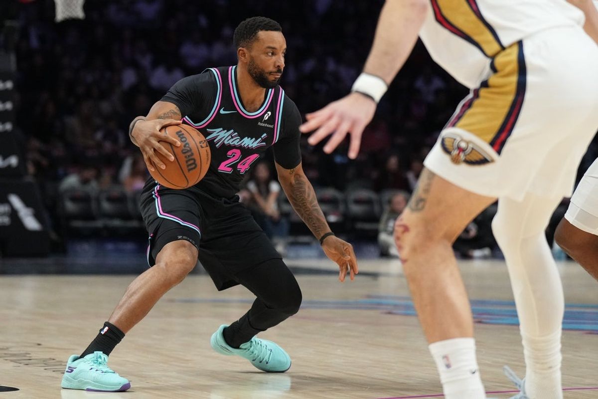 Jan 4, 2026; Miami, Florida, USA;  Miami Heat guard Norman Powell (24) drives to the basket against the New Orleans Pelicans during the first half at Kaseya Center. Mandatory Credit: Jim Rassol-Imagn Images