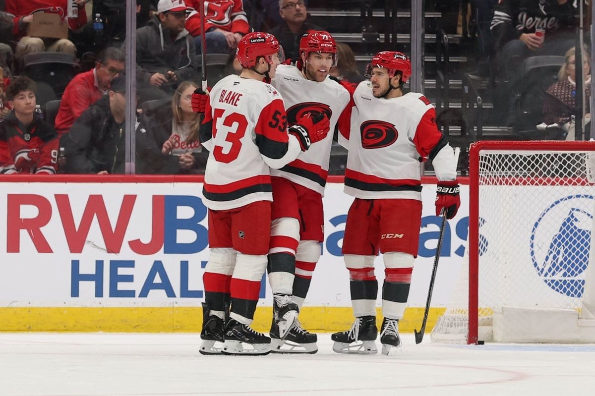 Jan 4, 2026; Newark, New Jersey, USA; Carolina Hurricanes left wing Taylor Hall (71) celebrates his goal against the New Jersey Devils during the second period at Prudential Center. Mandatory Credit: Ed Mulholland-Imagn Images