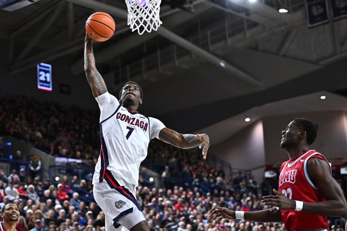 Jan 4, 2026; Spokane, Washington, USA; Gonzaga Bulldogs guard Tyon Grant-Foster (7) goes up for a dunk against the Loyola Marymount Lions in the first half at McCarthey Athletic Center. Mandatory Credit: James Snook-Imagn Images
