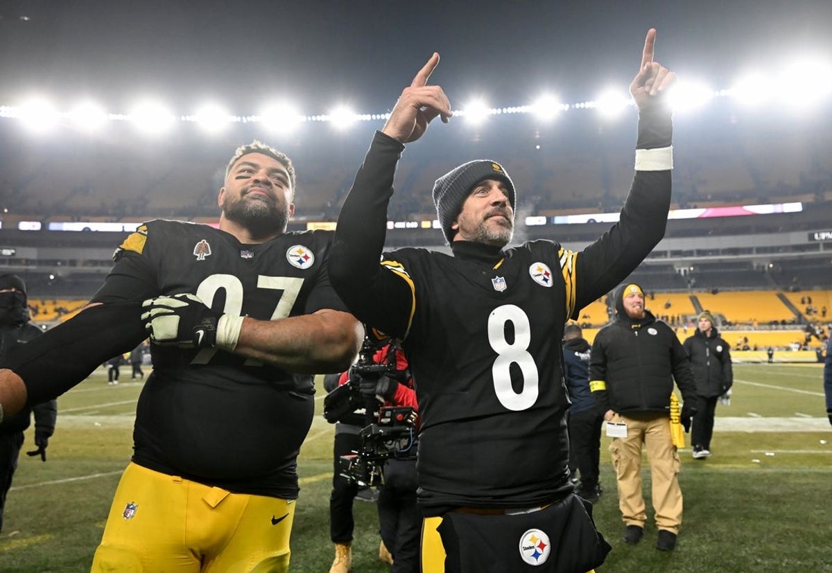 Jan 4, 2026; Pittsburgh, Pennsylvania, USA; Pittsburgh Steelers quarterback Aaron Rodgers (8) and defensive tackle Cameron Heyward (97) celebrate after defeating the Baltimore Ravens at Acrisure Stadium. Mandatory Credit: Barry Reeger-Imagn Images