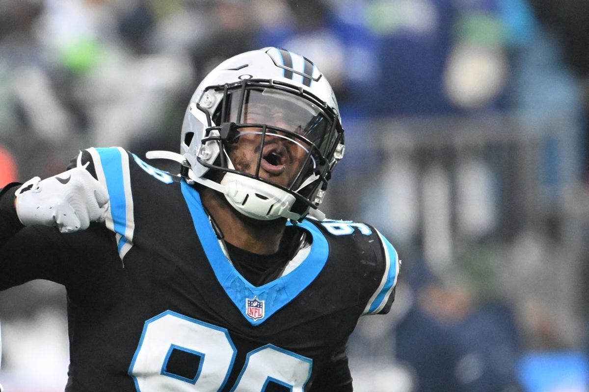 Dec 28, 2025; Charlotte, North Carolina, USA; Carolina Panthers linebacker D.J. Wonnum (98) reacts after a sack in the fourth quarter at Bank of America Stadium. Mandatory Credit: Bob Donnan-Imagn Images