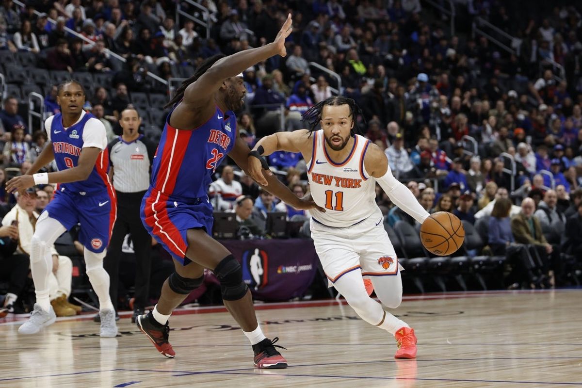 Jan 5, 2026; Detroit, Michigan, USA;  New York Knicks guard Jalen Brunson (11) dribbles on Detroit Pistons forward Isaiah Stewart (28) in the first half at Little Caesars Arena. Mandatory Credit: Rick Osentoski-Imagn Images