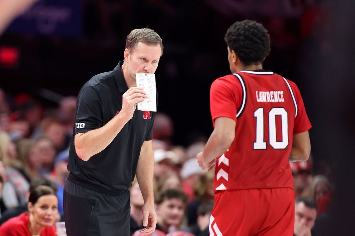 Jan 5, 2026; Columbus, Ohio, USA; Nebraska Cornhuskers head coach Fred Hoiberg talks to guard Jamarques Lawrence (10) during the second half against the Ohio State Buckeyes at Value City Arena. Mandatory Credit: Joseph Maiorana-Imagn Images