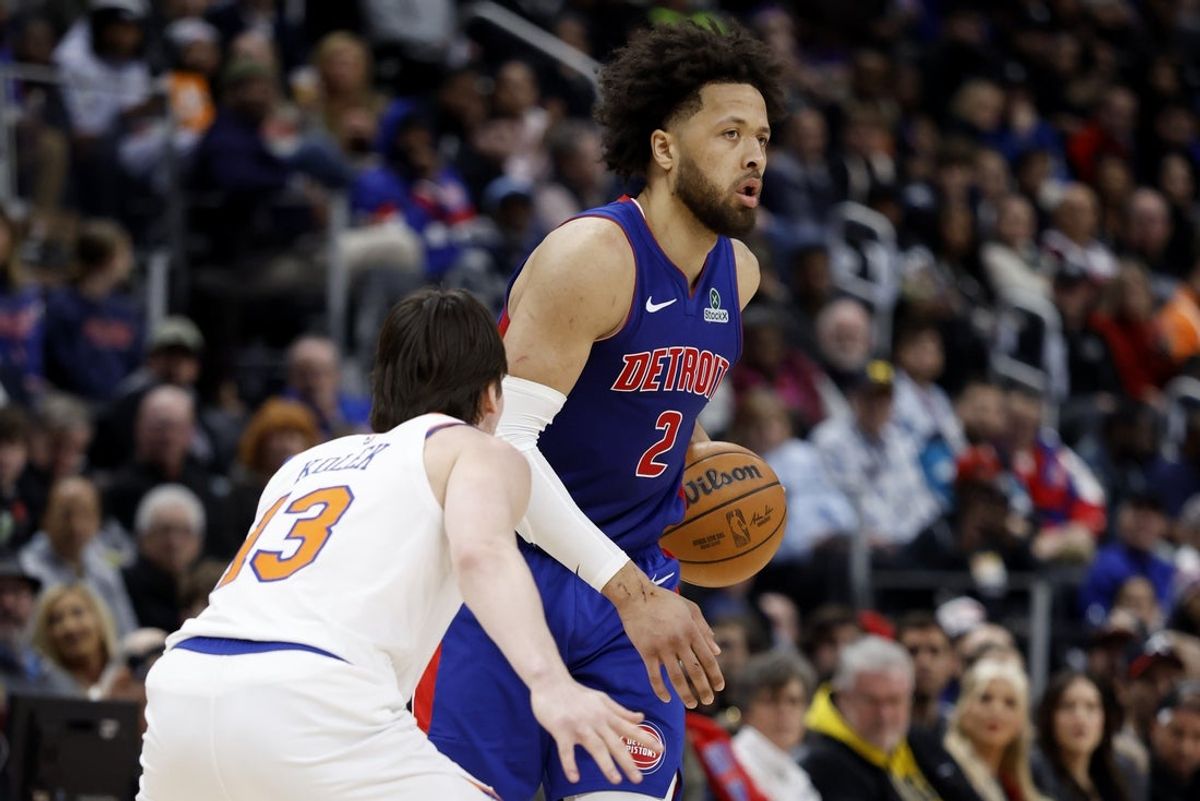 Jan 5, 2026; Detroit, Michigan, USA;  Detroit Pistons guard Cade Cunningham (2) dribbles defended by New York Knicks guard Tyler Kolek (13) in the second half at Little Caesars Arena. Mandatory Credit: Rick Osentoski-Imagn Images
