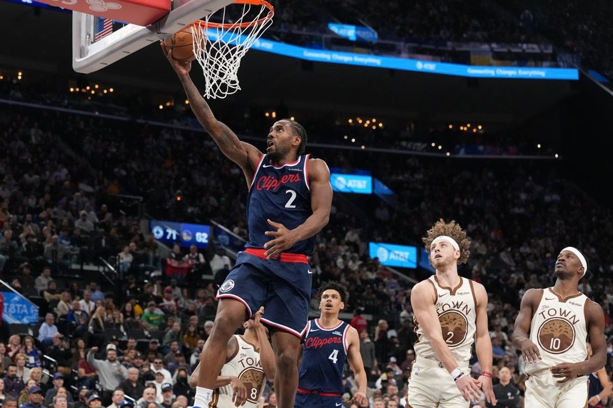 Jan 5, 2026; Inglewood, California, USA; LA Clippers forward Kawhi Leonard (2) shoots the ball against the Golden State Warriors in the second half at Intuit Dome. Mandatory Credit: Kirby Lee-Imagn Images