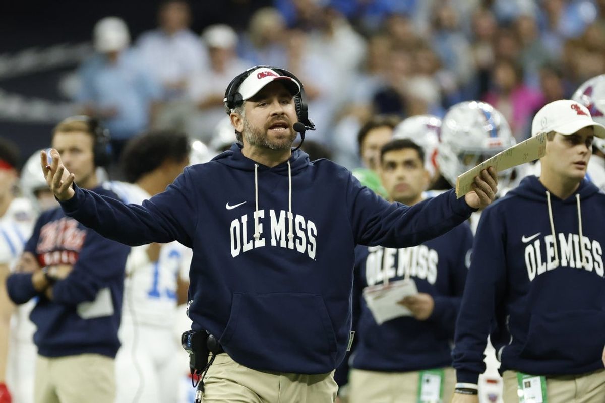 Jan 1, 2026; New Orleans, LA, USA; Mississippi Rebels head coach Pete Golding (center) reacts on the sidelines during the second half of the 2026 Sugar Bowl and quarterfinal game of the College Football Playoff against the Georgia Bulldogs at Caesars Superdome. Mandatory Credit: Amber Searls-Imagn Images