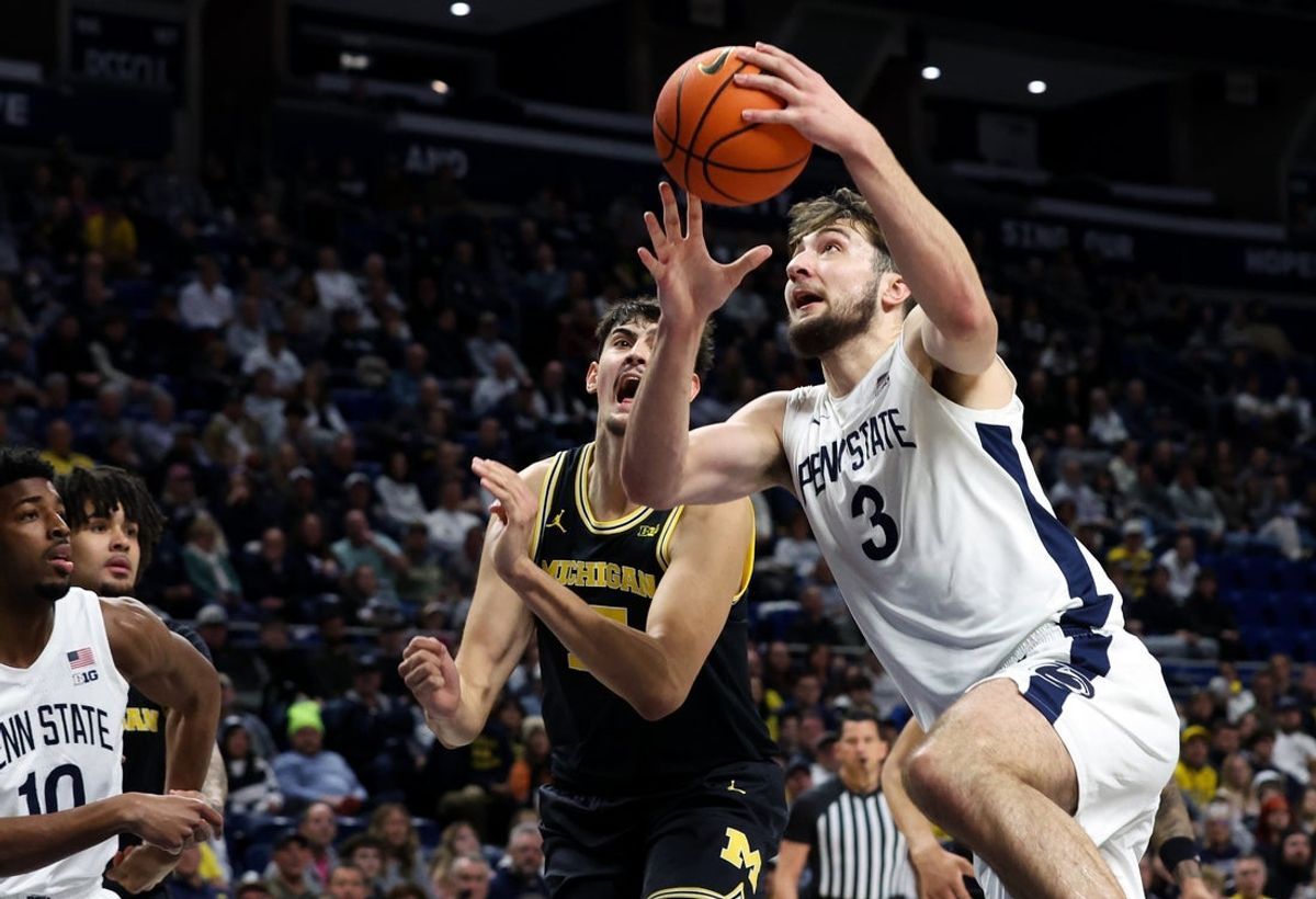 Jan 6, 2026; University Park, Pennsylvania, USA; Penn State Nittany Lions forward Ivan Juric (3) drives the ball to the basket during the first half against the Michigan Wolverines at Bryce Jordan Center. Mandatory Credit: Matthew O'Haren-Imagn Images