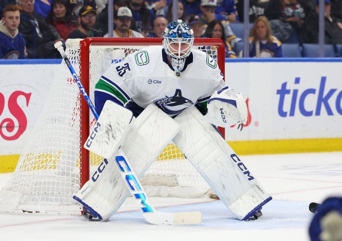 Jan 6, 2026; Buffalo, New York, USA;  Vancouver Canucks goaltender Thatcher Demko (35) looks for the puck during the second period against the Buffalo Sabres at KeyBank Center. Mandatory Credit: Timothy T. Ludwig-Imagn Images