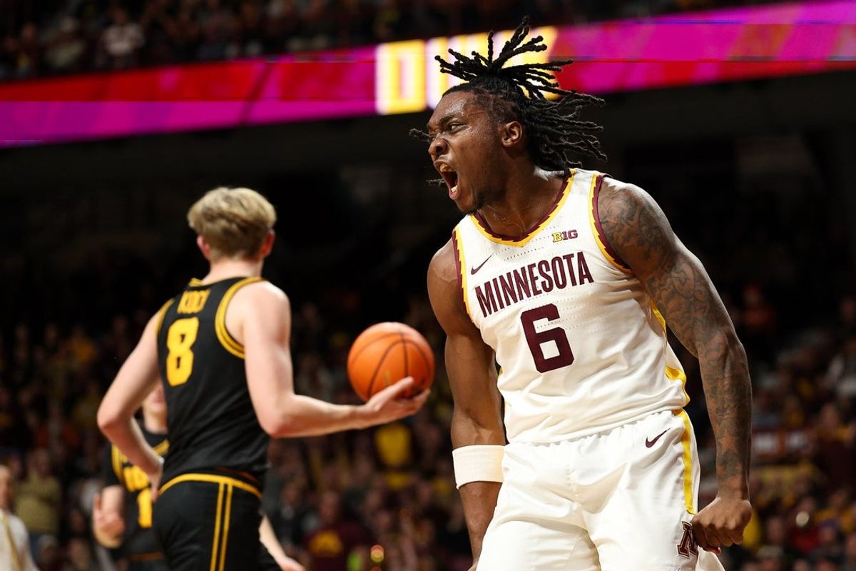Jan 6, 2026; Minneapolis, Minnesota, USA; Minnesota Golden Gophers guard Langston Reynolds (6) celebrates his dunk against the Iowa Hawkeyes during the first half at Williams Arena. Mandatory Credit: Matt Krohn-Imagn Images
