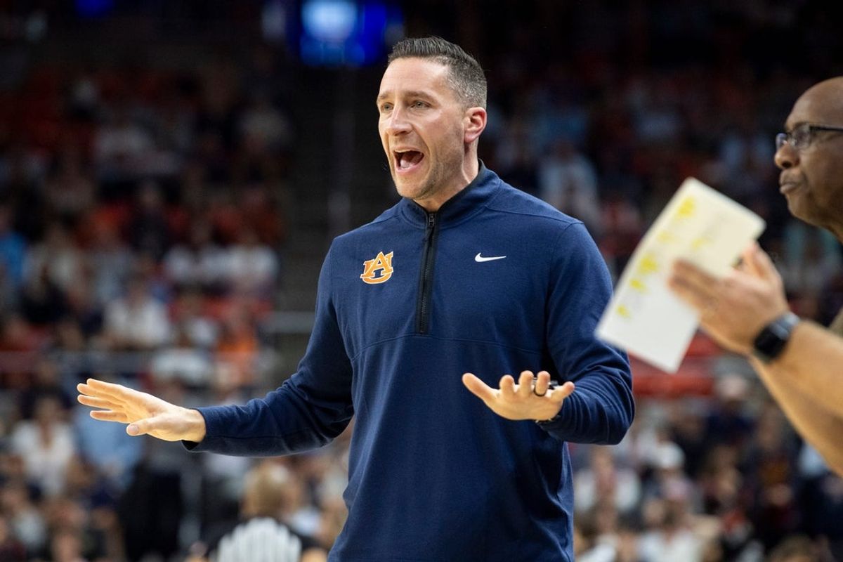 Auburn Tigers head coach Steven Pearl talks with his team as Auburn Tigers take on Texas A&M Aggies at Neville Arena in Auburn, Ala. on Tuesday, Jan. 6, 2026.