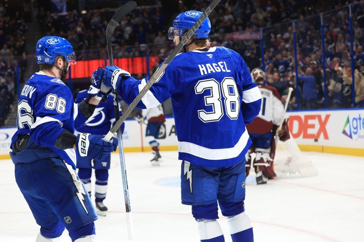Jan 6, 2026; Tampa, Florida, USA; Tampa Bay Lightning left wing Brandon Hagel (38) is congratulated by right wing Nikita Kucherov (86) after he scored a goal against the Colorado Avalanche during the third period at Benchmark International Arena. Mandatory Credit: Kim Klement Neitzel-Imagn Images