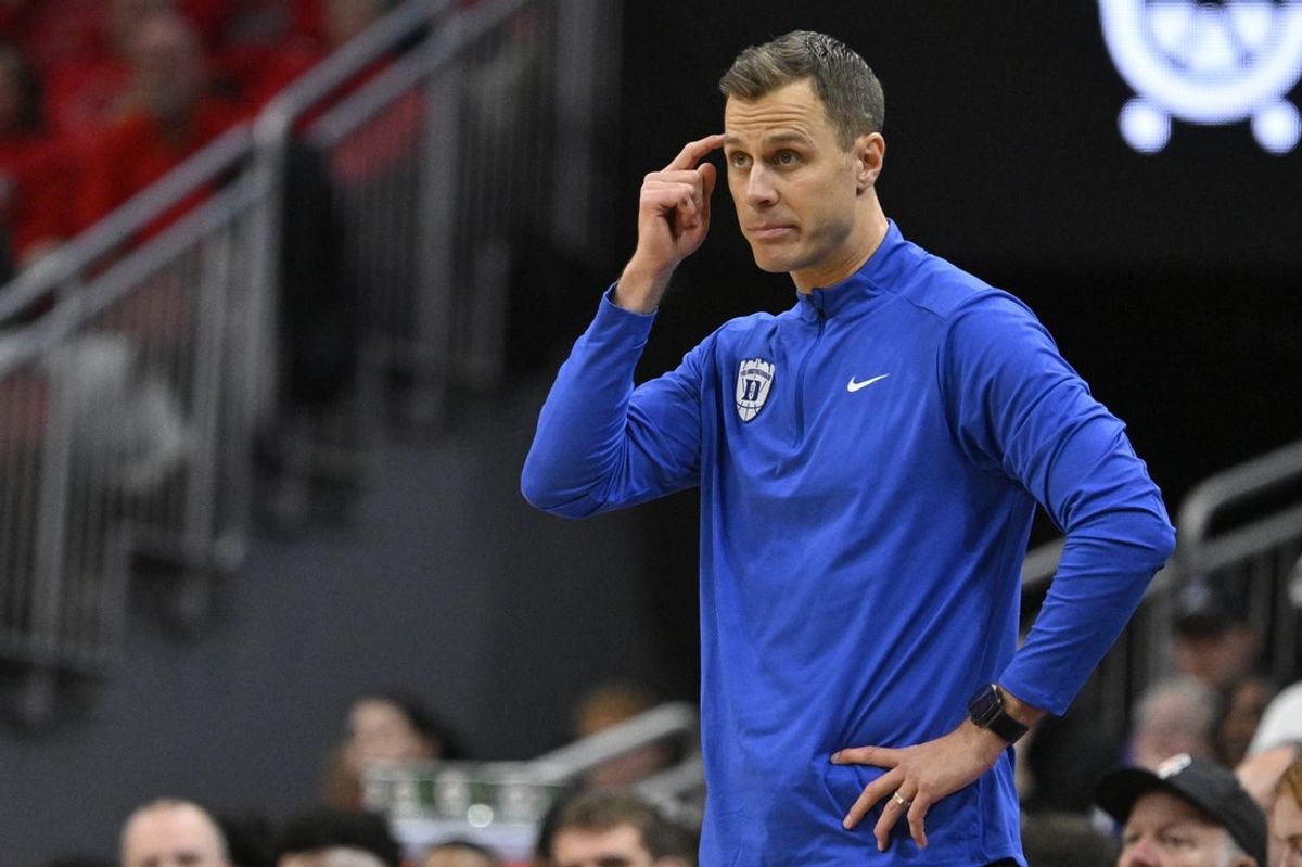 Jan 6, 2026; Louisville, Kentucky, USA;  Duke Blue Devils head coach Jon Scheyer reacts during the second half against the Louisville Cardinals at KFC Yum! Center. Duke defeated Louisville 84-73. Mandatory Credit: Jamie Rhodes-Imagn Images