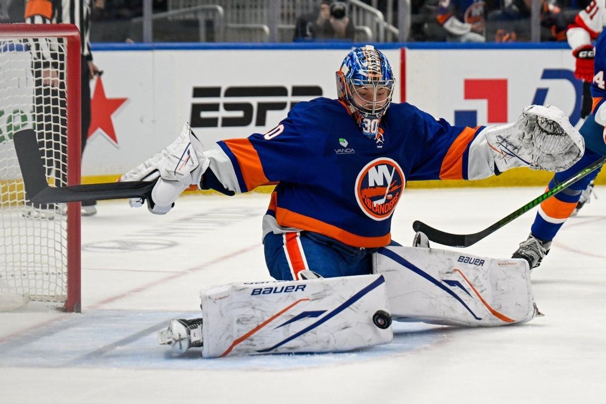Jan 6, 2026; Elmont, New York, USA;  New York Islanders goaltender Ilya Sorokin (30) makes a save against the New Jersey Devils during the third period at UBS Arena. Mandatory Credit: Dennis Schneidler-Imagn Images