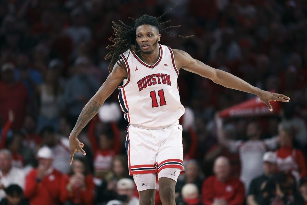 Jan 6, 2026; Houston, Texas, USA; Houston Cougars forward Joseph Tugler (11) reacts after a play during the second half against the Texas Tech Red Raiders at Fertitta Center. Mandatory Credit: Troy Taormina-Imagn Images