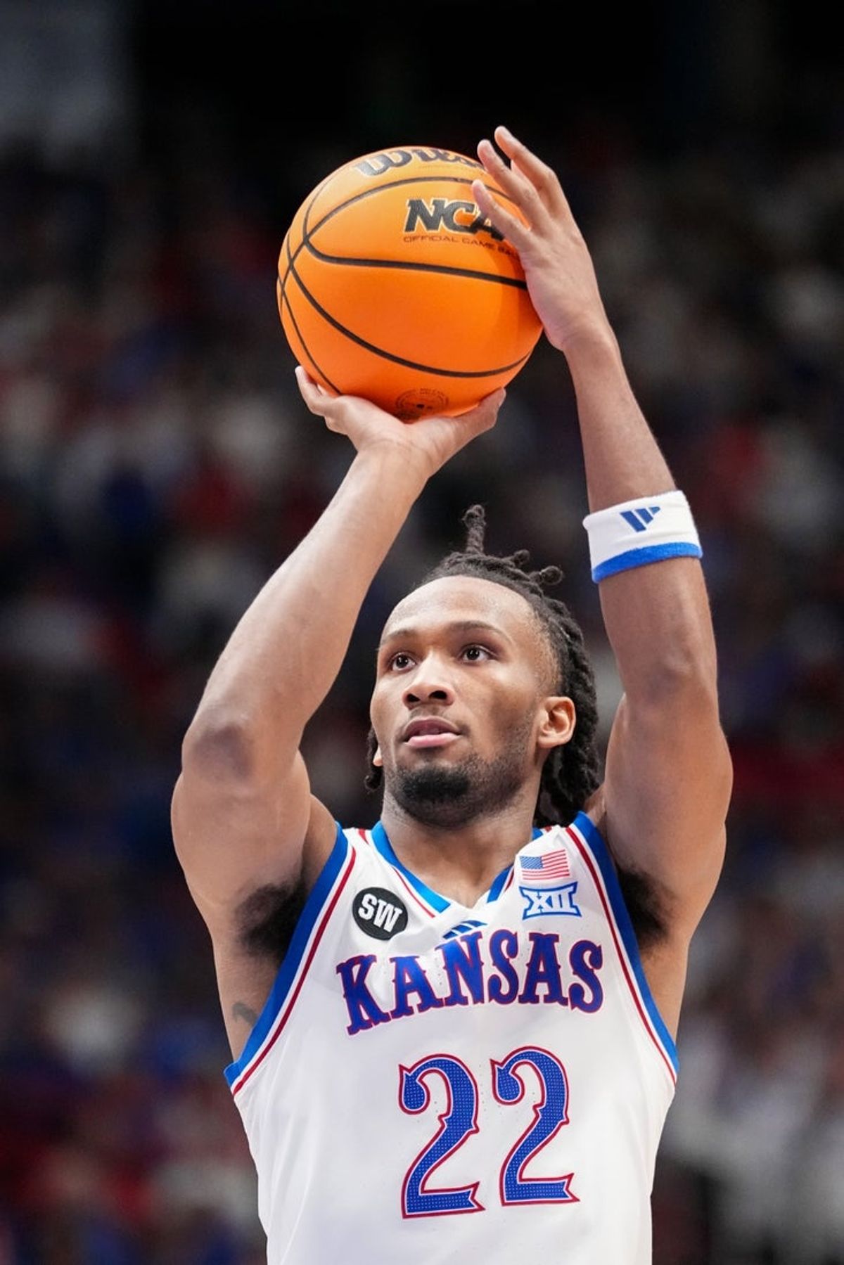 Jan 6, 2026; Lawrence, Kansas, USA; Kansas Jayhawks guard Darryn Peterson (22) shoots a free throw against the TCU Horned Frogs during the second half of the game at Allen Fieldhouse. Mandatory Credit: Denny Medley-Imagn Images