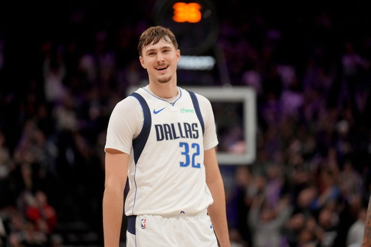 Jan 6, 2026; Sacramento, California, USA; Dallas Mavericks forward Cooper Flagg (32) reacts after a foul was called during action against the Sacramento Kings in the fourth quarter at the Golden 1 Center. Mandatory Credit: Cary Edmondson-Imagn Images