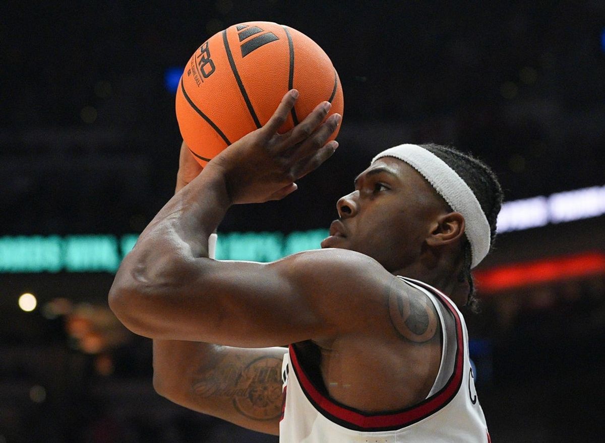 Louisville Cardinals guard Ryan Conwell (3) scores a three-point shot against Duke Tuesday night at KFC Yum Center January 6, 2026. Conwell finished with 24 points and was 4-for-11 in three-point shooting. The Cards went 2-for-11 in second half three-point shooting; first half Cards were 10-for-21.
