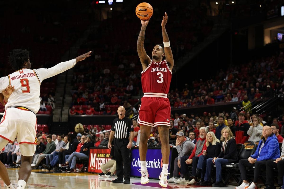 Jan 7, 2026; College Park, Maryland, USA; Indiana Hoosiers guard Lamar Wilkerson (3) takes a shot over Maryland Terrapins forward Solomon Washington (9) during the first half at Xfinity Center. Mandatory Credit: Daniel Kucin Jr.-Imagn Images