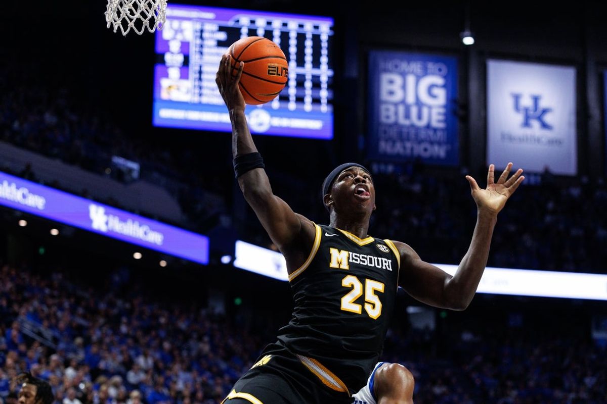 Jan 7, 2026; Lexington, Kentucky, USA; Missouri Tigers forward Mark Mitchell (25) takes the ball to the basket during the first half against the Kentucky Wildcats at Rupp Arena at Central Bank Center. Mandatory Credit: Jordan Prather-Imagn Images