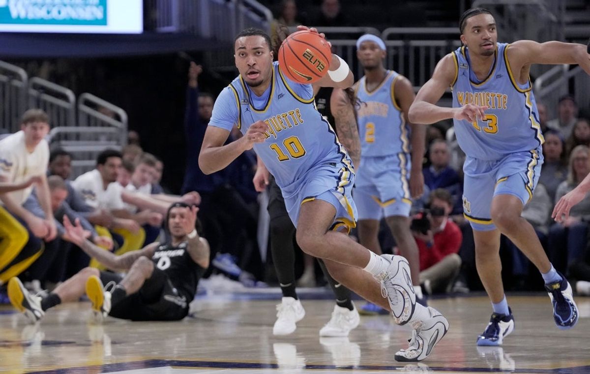 Marquette guard Nigel James Jr. (0) makes a fast break after a steal during the first half of their game against the Xavier Wednesday, January 7, 2026 at Fiserv Forum in Milwaukee, Wisconsin.