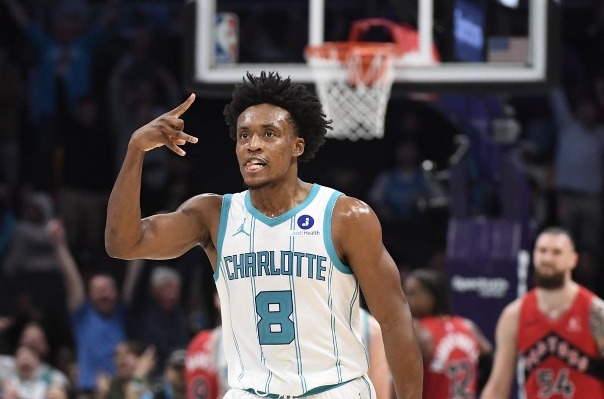 Jan 7, 2026; Charlotte, North Carolina, USA;  Charlotte Hornets guard Collin Sexton (8) reacts after scoring during the second half against the Toronto Raptors at the Spectrum Center. Mandatory Credit: Sam Sharpe-Imagn Images