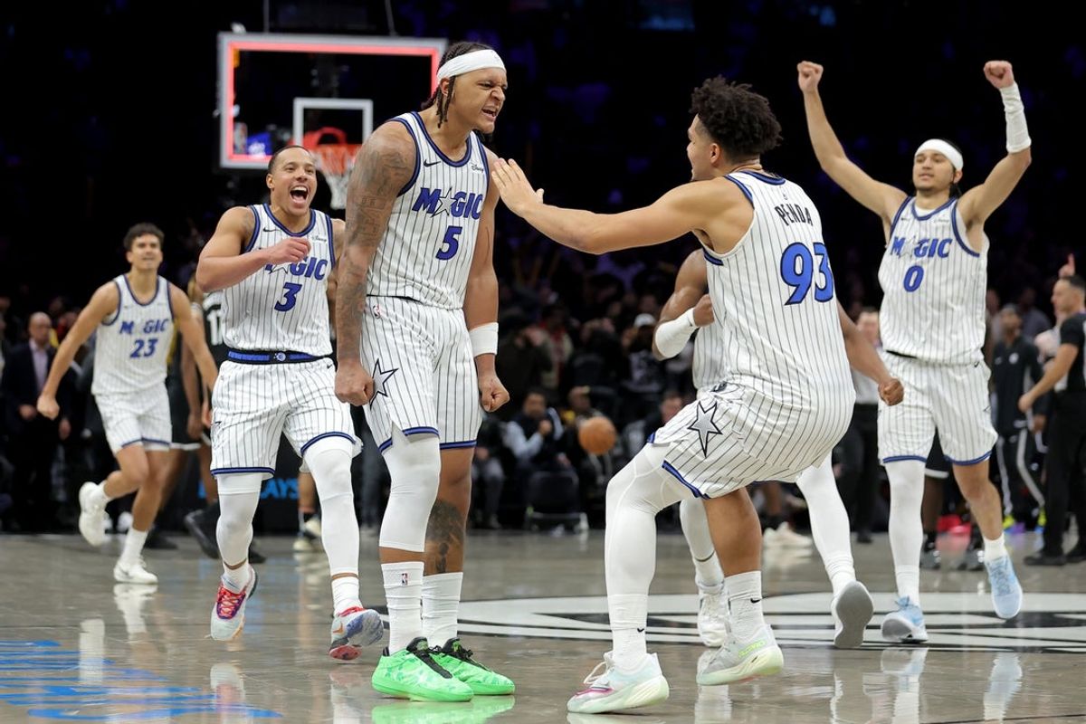 Jan 7, 2026; Brooklyn, New York, USA; Orlando Magic forward Paolo Banchero (5) celebrates with teammates after his overtime game-winning three point shot against the Brooklyn Nets at Barclays Center. Mandatory Credit: Brad Penner-Imagn Images