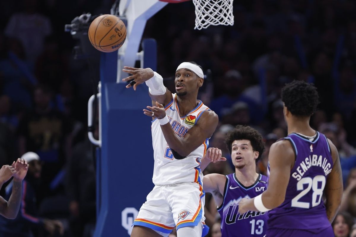 Jan 7, 2026; Oklahoma City, Oklahoma, USA; Oklahoma City Thunder guard Shai Gilgeous-Alexander (2) passes against the Utah Jazz during the second half at Paycom Center. Mandatory Credit: Alonzo Adams-Imagn Images
