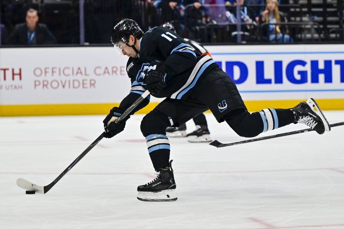 Jan 7, 2026; Salt Lake City, Utah, USA; Utah Mammoth right wing Dylan Guenther (11) takes a shot during second period against the Ottawa Senators at Delta Center. Mandatory Credit: Peter Creveling-Imagn Images