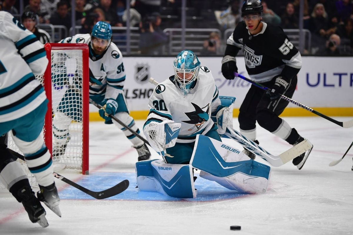 Jan 7, 2026; Los Angeles, California, USA; San Jose Sharks goaltender Yaroslav Askarov (30) defends the goal against the Los Angeles Kings during the second period at Crypto.com Arena. Mandatory Credit: Gary A. Vasquez-Imagn Images