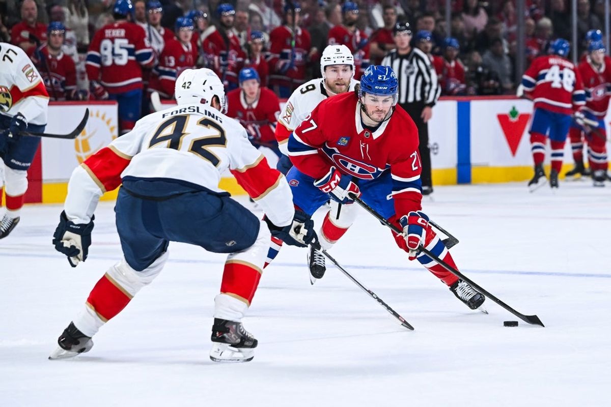 Jan 8, 2026; Montreal, Quebec, CAN; Montreal Canadiens left wing Samuel Blais (27) plays the puck against Florida Panthers defenseman Gustav Forsling (42) during the first period at Bell Centre. Mandatory Credit: David Kirouac-Imagn Images
