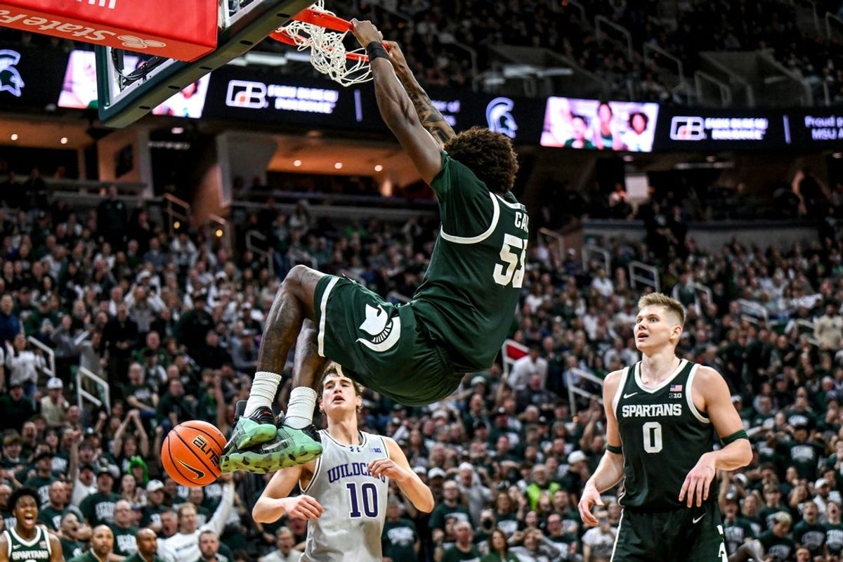 Michigan State's Coen Carr dunks against Northwestern during the second half on Thursday, Jan. 8, 2026, at the Breslin Center in East Lansing.