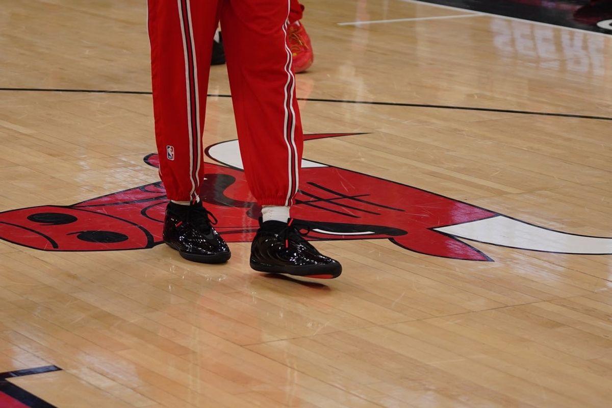 Jan 8, 2026; Chicago, Illinois, USA; Chicago Bulls forward Dalen Terry (7) stands on the court as the game against the Miami Heat is delayed because of condensation on the court due to humidity and rain at United Center. Mandatory Credit: David Banks-Imagn Images