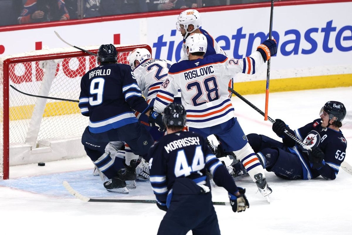 Jan 8, 2026; Winnipeg, Manitoba, CAN; Winnipeg Jets defenseman Josh Morrissey (44) scores on Edmonton Oilers goaltender Calvin Pickard (30) in the first period at Canada Life Centre. Mandatory Credit: James Carey Lauder-Imagn Images