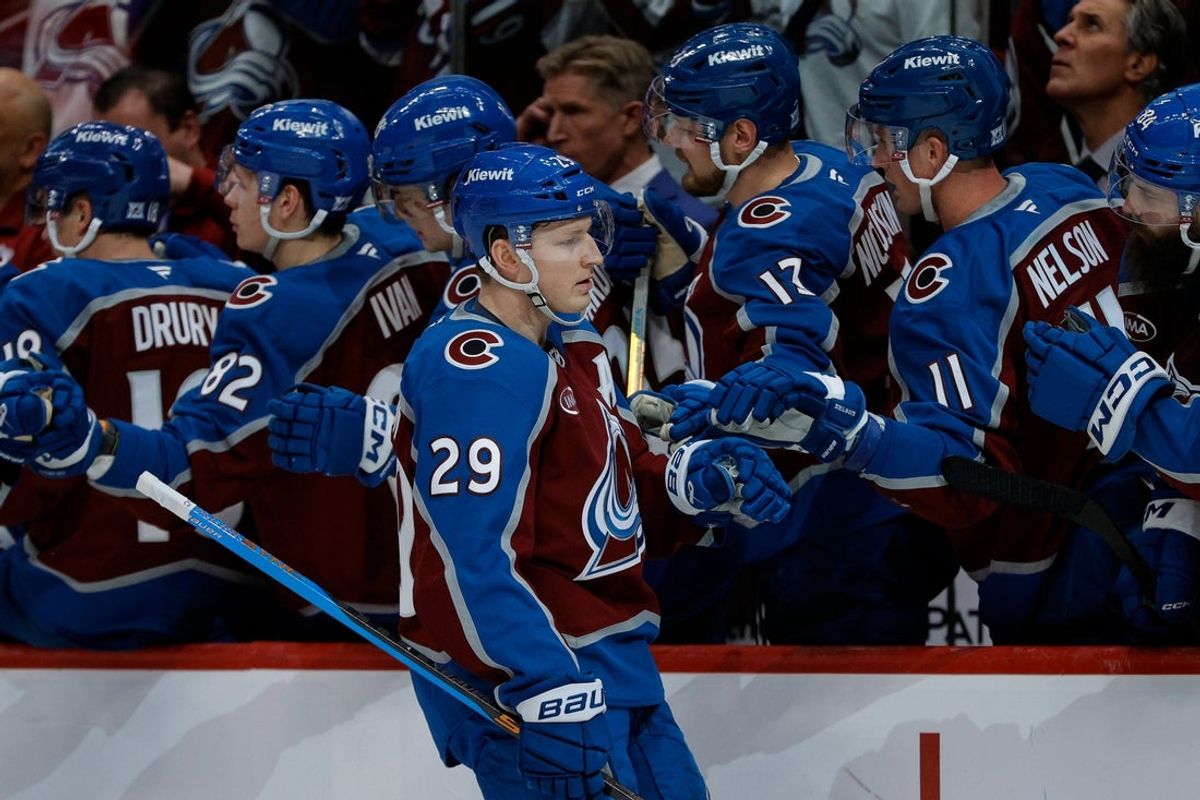 Jan 8, 2026; Denver, Colorado, USA; Colorado Avalanche center Nathan MacKinnon (29) celebrates with the bench after his goal in the first period against the Ottawa Senators at Ball Arena. Mandatory Credit: Isaiah J. Downing-Imagn Images