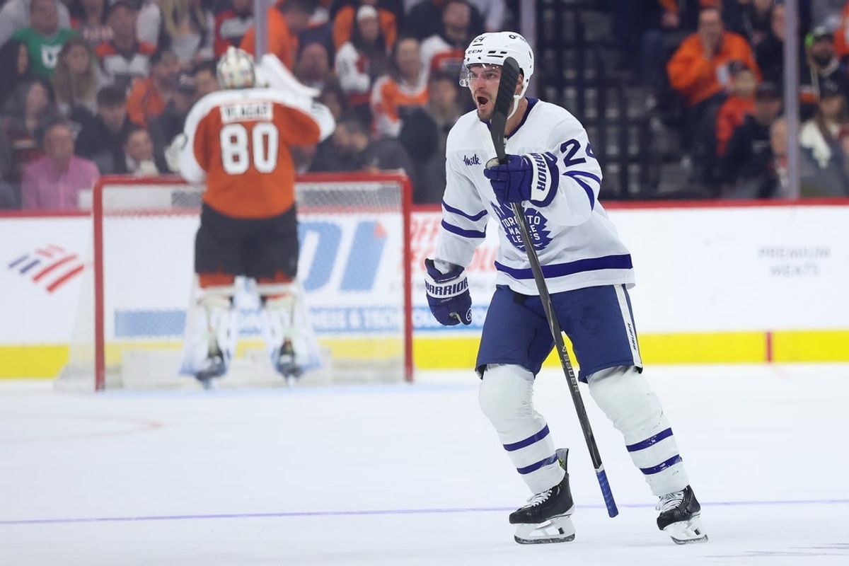 Jan 8, 2026; Philadelphia, Pennsylvania, USA; Toronto Maple Leafs center Scott Laughton (24) reacts after scoring against Philadelphia Flyers goaltender Dan Vladar (80) during the third period at Xfinity Mobile Arena. Mandatory Credit: Bill Streicher-Imagn Images