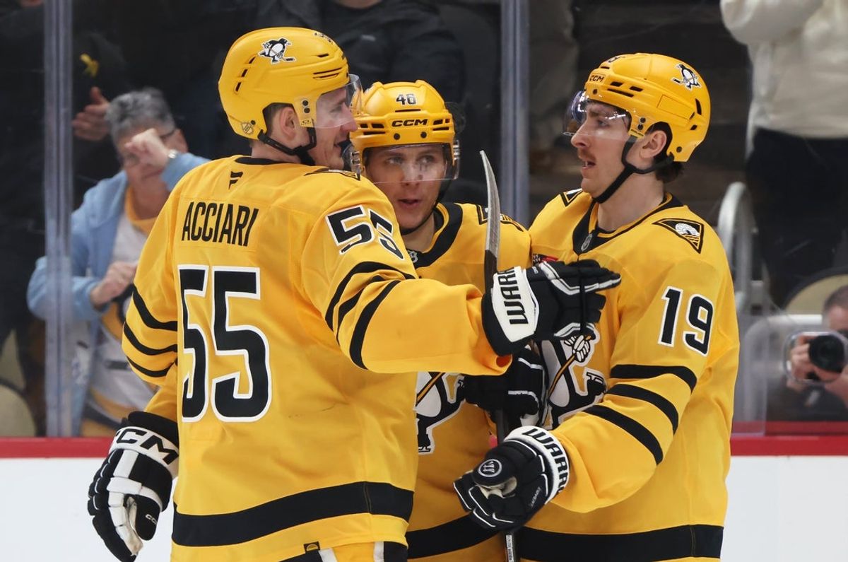 Jan 8, 2026; Pittsburgh, Pennsylvania, USA;  Pittsburgh Penguins center Noel Acciari (55) and center Connor Dewar (19) celebrate a goal by center Blake Lizotte (middle) against the New Jersey Devils during the third period at PPG Paints Arena. Mandatory Credit: Charles LeClaire-Imagn Images