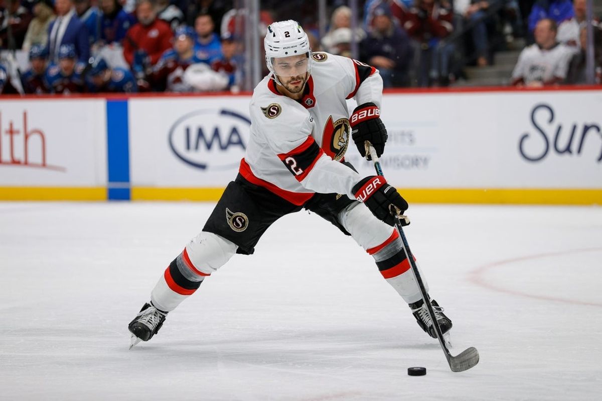Jan 8, 2026; Denver, Colorado, USA; Ottawa Senators defenseman Artem Zub (2) controls the puck in the second period against the Colorado Avalanche at Ball Arena. Mandatory Credit: Isaiah J. Downing-Imagn Images