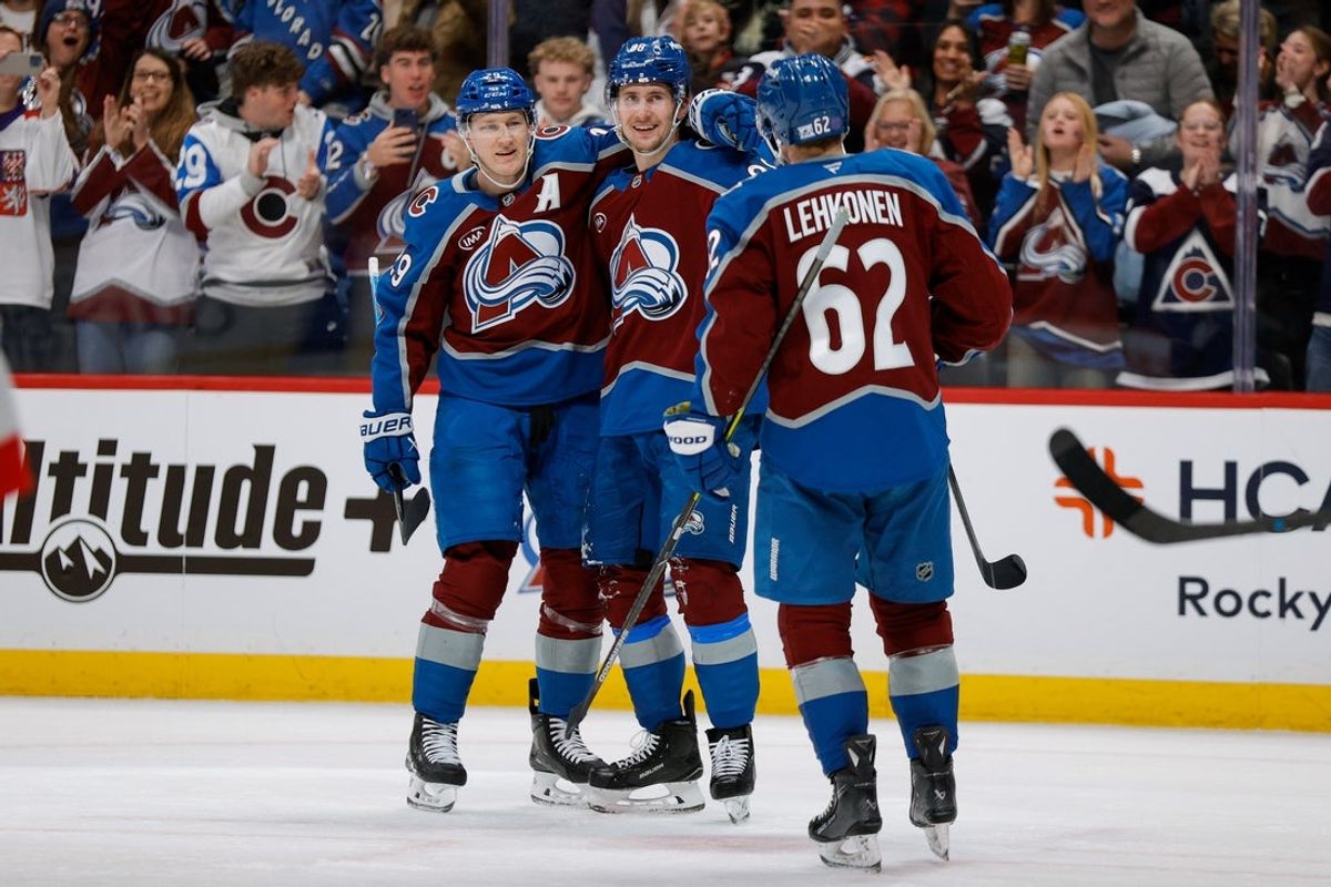 Jan 8, 2026; Denver, Colorado, USA; Colorado Avalanche center Martin Necas (88) celebrates his goal with center Nathan MacKinnon (29) and left wing Artturi Lehkonen (62) in the second period against the Ottawa Senators at Ball Arena. Mandatory Credit: Isaiah J. Downing-Imagn Images