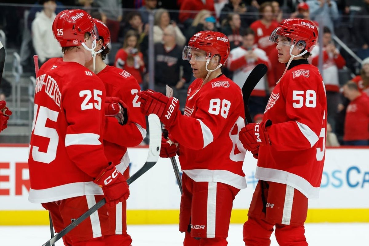 Jan 8, 2026; Detroit, Michigan, USA;  Detroit Red Wings right wing Patrick Kane (88) celebrates with team mates after defeating against the Vancouver Canucks at Little Caesars Arena. Mandatory Credit: Rick Osentoski-Imagn Images