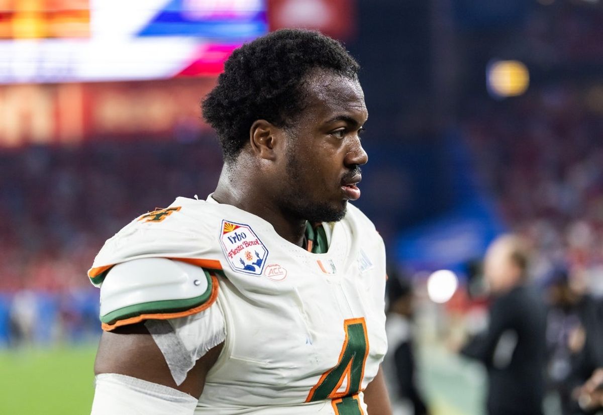 Jan 8, 2026; Glendale, AZ, USA; Miami Hurricanes defensive lineman Rueben Bain Jr. (4) against the Mississippi Rebels during the 2026 Fiesta Bowl and semifinal game of the College Football Playoff at State Farm Stadium. Mandatory Credit: Mark J. Rebilas-Imagn Images