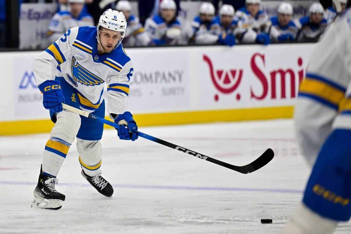 Jan 9, 2026; Salt Lake City, Utah, USA; St. Louis Blues defenseman Philip Broberg (6) makes a quick pass during first period against the Utah Mammoth at Delta Center. Mandatory Credit: Peter Creveling-Imagn Images