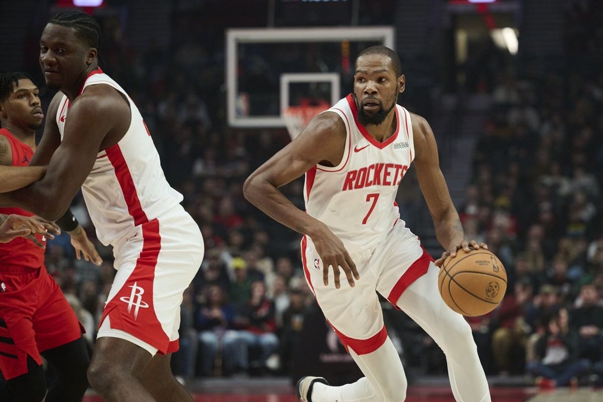 Jan 9, 2026; Portland, Oregon, USA; Houston Rockets forward Kevin Durant (7) drives to the basket during the first half against the Portland Trail Blazers at Moda Center. Mandatory Credit: Troy Wayrynen-Imagn Images