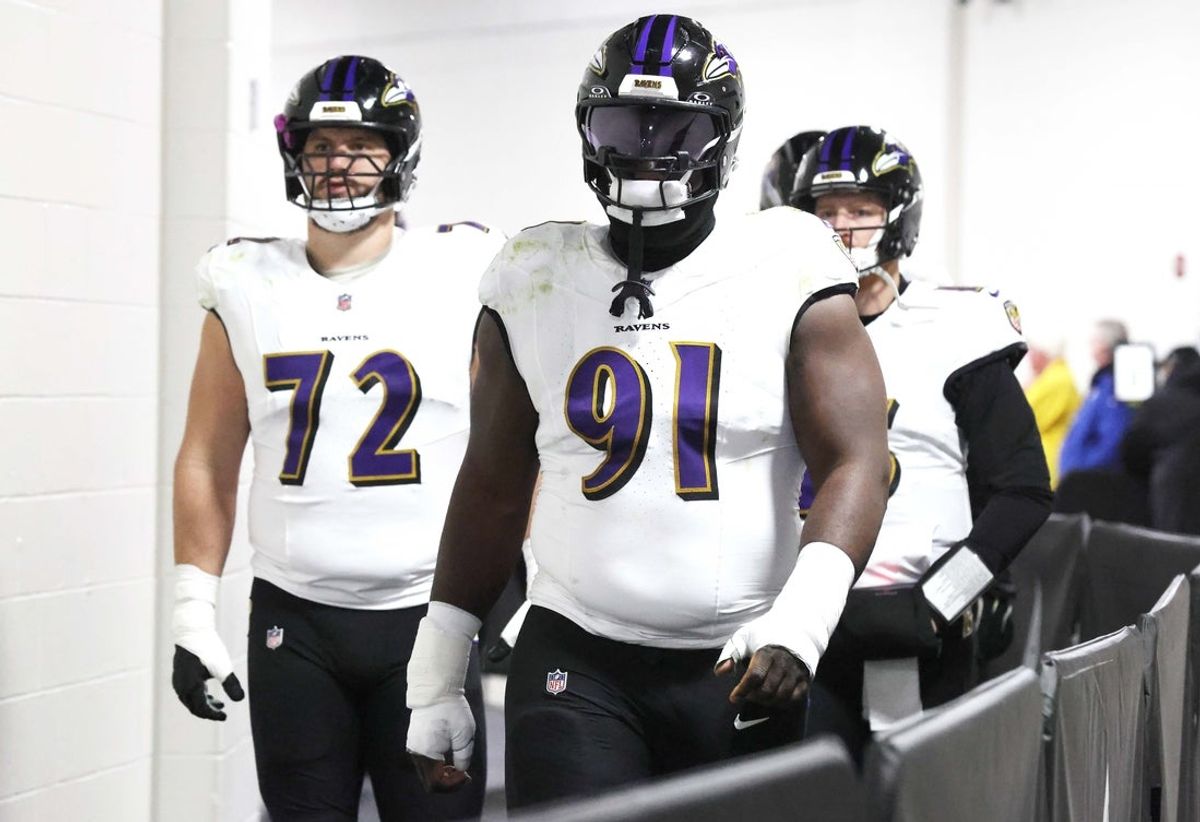 Jan 4, 2026; Pittsburgh, Pennsylvania, USA;  Baltimore Ravens defensive tackle CJ Okoye (91) walks to the field to play the Pittsburgh Steelers at Acrisure Stadium. Mandatory Credit: Charles LeClaire-Imagn Images