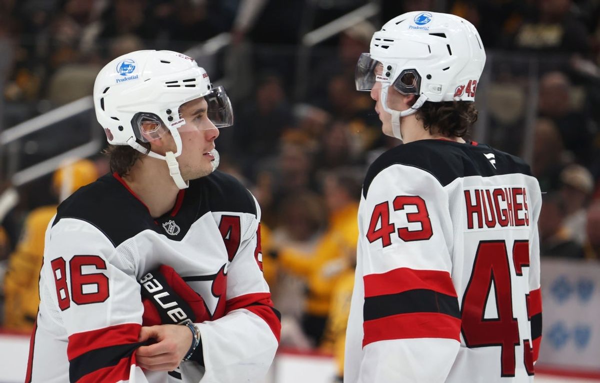 Jan 8, 2026; Pittsburgh, Pennsylvania, USA;  New Jersey Devils center Jack Hughes (86) talks with his brother defenseman Luke Hughes (43) before the start of the third period against the Pittsburgh Penguins at PPG Paints Arena. Mandatory Credit: Charles LeClaire-Imagn Images