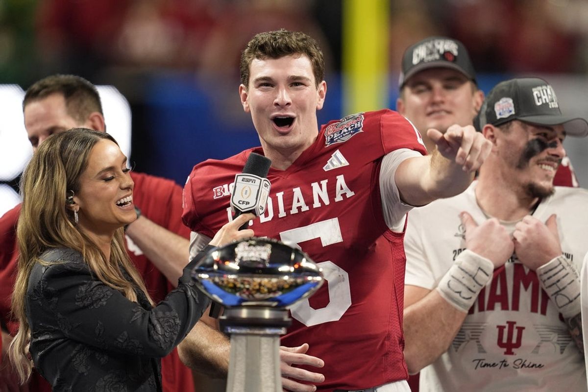 Jan 9, 2026; Atlanta, GA, USA; Indiana Hoosiers quarterback Fernando Mendoza (15) reacts after the 2025 Peach Bowl and semifinal game of the College Football Playoff at Mercedes-Benz Stadium. Mandatory Credit: Dale Zanine-Imagn Images